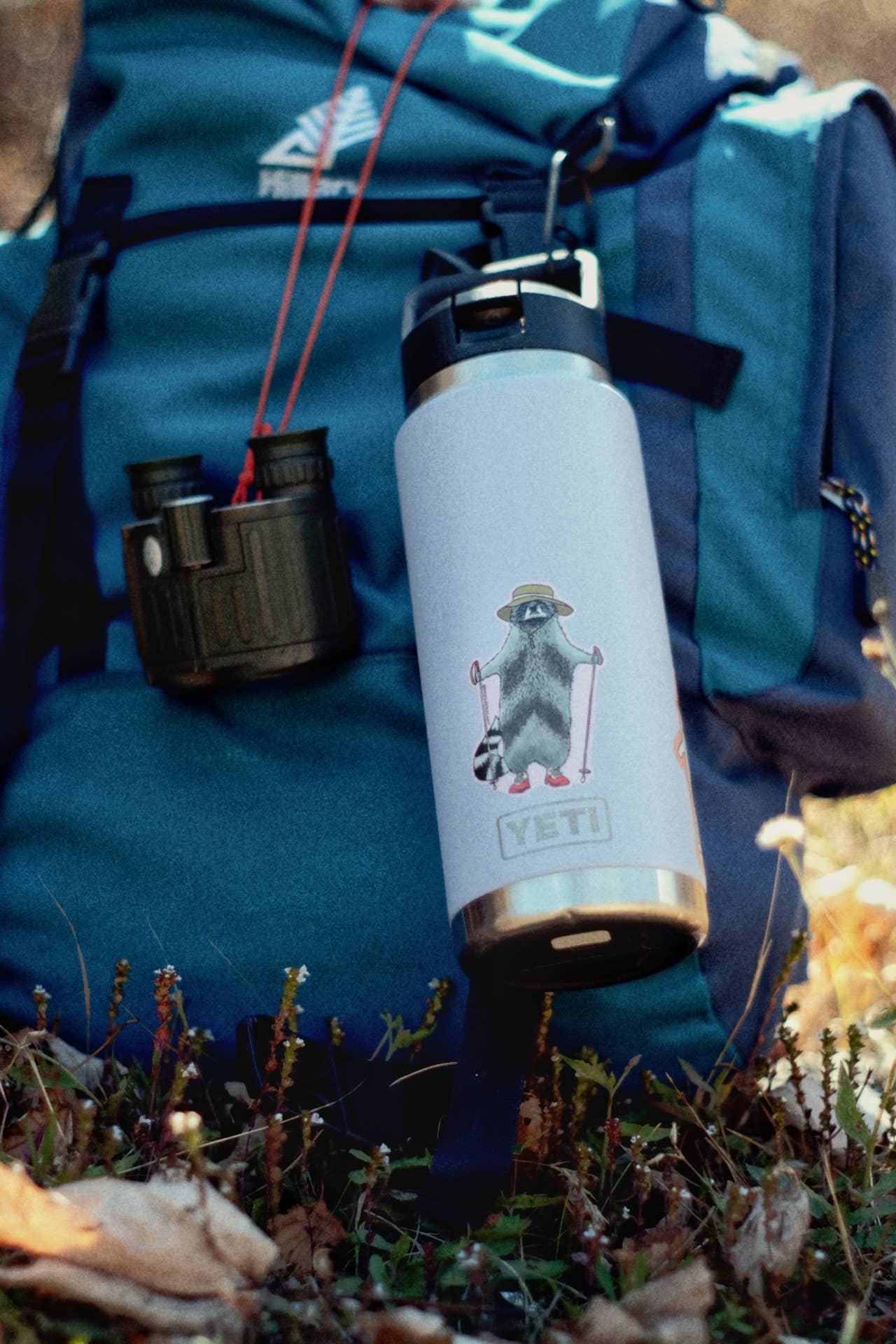 Hiking Raccoon Sticker